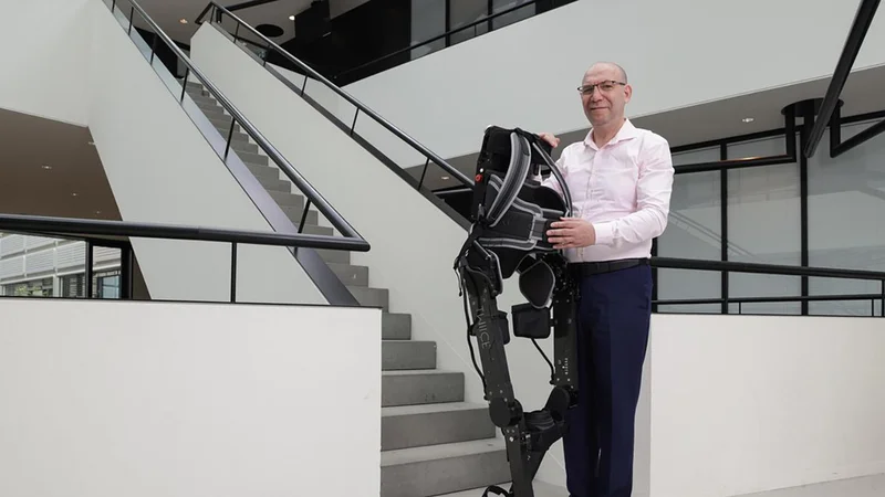 Robotician Mohamed Bouri with TWIICE exoskeleton - 2024 EPFL / Alain Herzog - CC-BY-SA 4.0