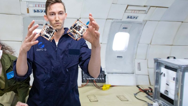 MIT PhD student Martin Nisser tests self-reconfiguring robot blocks, or ElectroVoxels, in microgravity. Photo: Steve Boxall/ZeroG