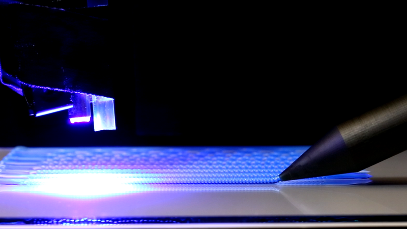 Multimaterial 3D printing with a twist