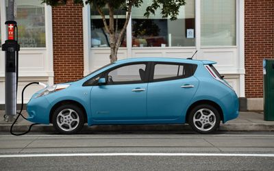 Lighting the way for electric vehicles by using streetlamps as chargers