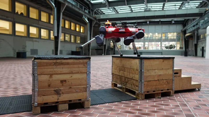 The quadrupedal robot ANYmal practises parkour in a hall at ETH Zurich. (Photograph: ETH Zurich / Nikita Rudin)