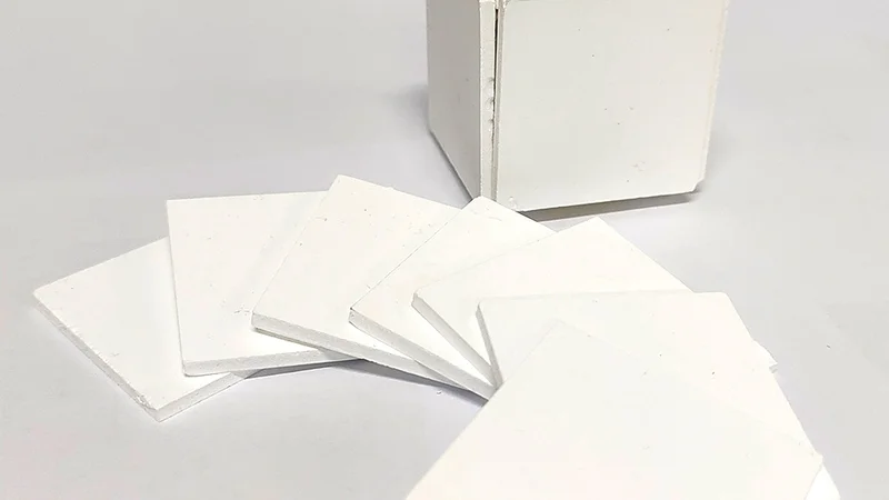 The PMMA sheets fabricated by materials science researchers are white and porous, making them a suitable material for covering buildings for passive daytime cooling. Credit: Provided by Yupeng Li/Dalian University of Technology. All Rights Reserved.