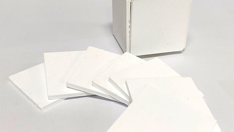 The PMMA sheets fabricated by materials science researchers are white and porous, making them a suitable material for covering buildings for passive daytime cooling. Credit: Provided by Yupeng Li/Dalian University of Technology. All Rights Reserved.