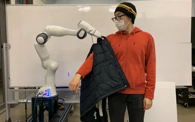 Podcast: Climate Change AI, Robots Getting You Dressed, Drones Evacuating Nursing Homes