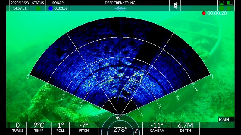 Sonar scan overlay with camera image in background.