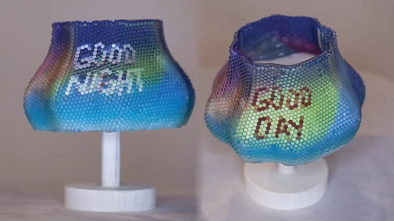 This lampshade, printed in-place on a commercial multi-material 3D printer, shows what's possible with MIT's lenticular object technology.