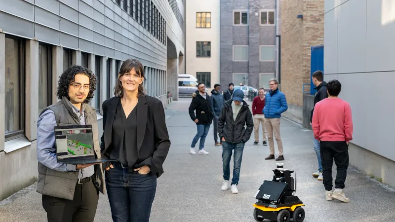 Sepehr Samavi and Prof Angela Schoellig next to robot Jack. Credit: Astrid Eckert / TUM