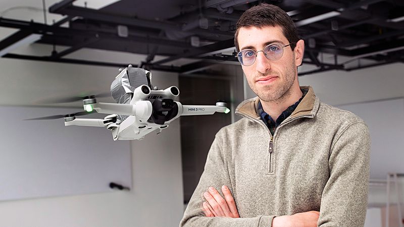 Michael Soskind, first author and graduate student in electrical and computer engineering, stands with the drone. Photo by Bumper DeJesus
