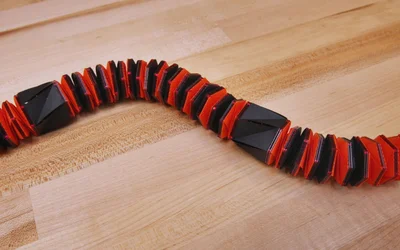 Caterbot? Robotapillar? It crawls with ease through loops and bends