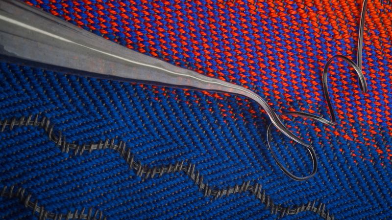 An MIT team has designed an “acoustic fabric,” woven with a fiber that is designed from a “piezoelectric” material that produces an electrical signal when bent or mechanically deformed, providing a means for the fabric to convert sound vibrations into electrical signals. Image: Greg Hren