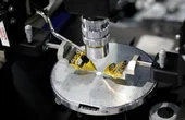 Programmable optical chip merges photons to change color