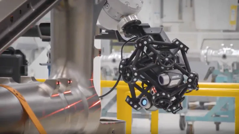The MetraSCAN 3D R-Series is a robot mounted 3D laser CMM to inspect directly on the production line
