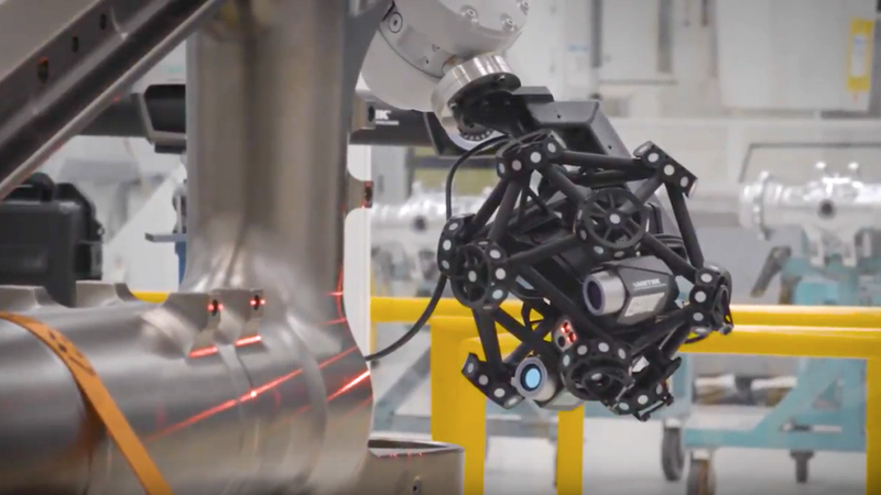 The MetraSCAN 3D R-Series is a robot mounted 3D laser CMM to inspect directly on the production line