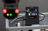 Vendor-neutral automated optical inspection using edge AI and collaborative robotics