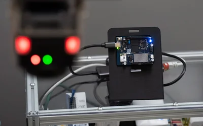 Vendor-neutral automated optical inspection using edge AI and collaborative robotics