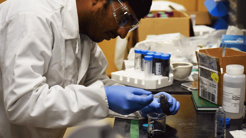 Graduate student Kailash Arole uses electrochemical exfoliation to separate graphene from petroleum coke. | Image: Texas A&M Engineering