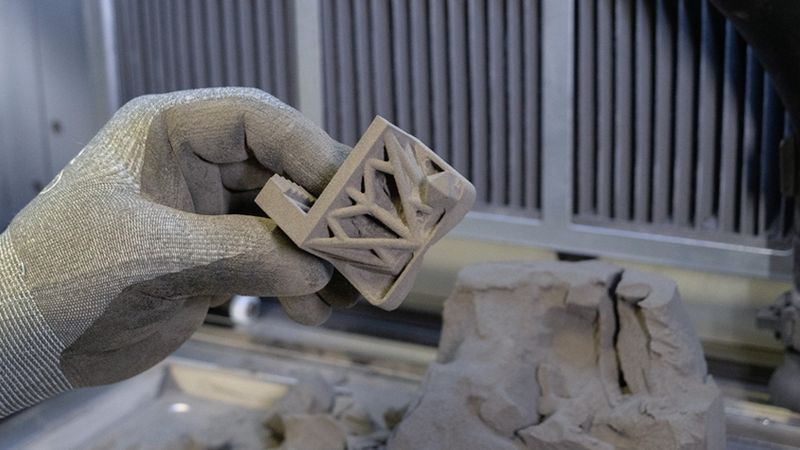 Why are SLS 3D printers suitable for small businesses?