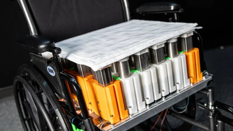 A customized wheelchair system — including fabric sensors, actuators, and fans — designed to prevent pressure injuries. (Photo: Candler Hobbs)