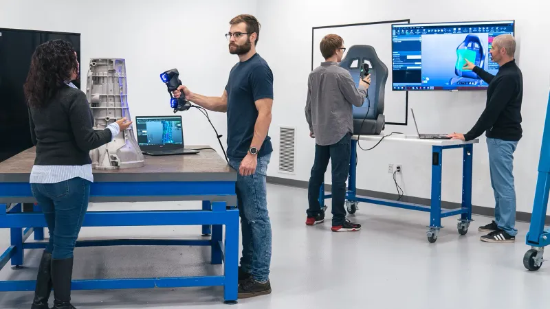 In an engineering lab, students learn how to 3D scan objects in real-time.