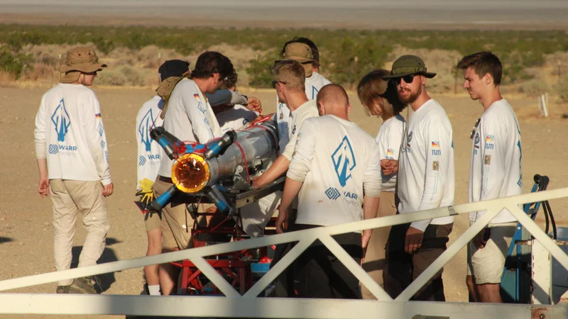 The assembly team preparing the rocket. 
