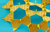 Microscale kirigami robot folds into 3D shapes and crawls