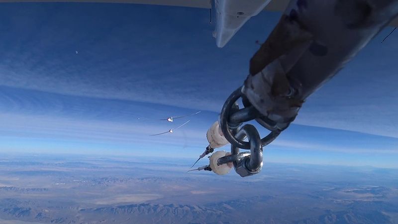 Released at nine kilometres altitude. Image from the tail camera of the Egrett as it released the Blue Condor Arcus glider from its tow. The Blue Condor, with a hydrogen engine and an optically very thin contrail, is at the front. Credit: AV Experts LLC