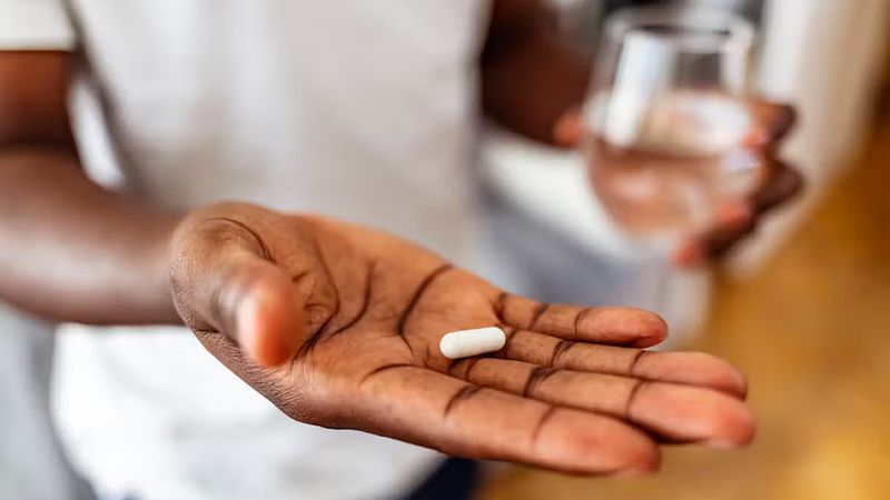 Graduate student Claire Najjuuko set out to develop a machine learning model to predict which adolescents with HIV would be less likely to adhere to antiretroviral therapy. With such knowledge, health care practitioners could implement interventions for those identified as less likely to adhere to the treatment plan. (Credit: iStock photo)